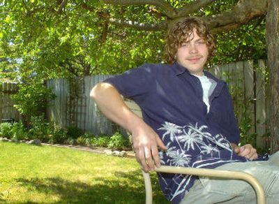 
Casey Lundquist poses in the backyard of his Spokane area home.
 (Joe Barrentine / The Spokesman-Review)