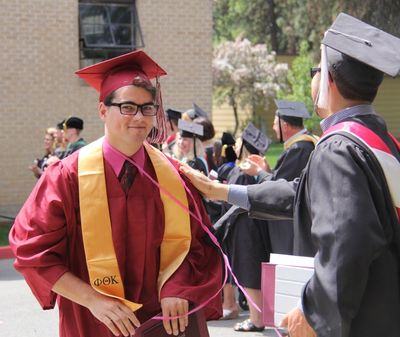 NIC alumni Duncan Menzies at NIC’s 2014 graduation. (NIC Press Room photo)