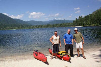 
Bobby Clifford, Tom Taylor and Chris Clifford pose for a picture after kayaking on Upper Priest Lake. 
 (Mike Kincaid PhotosThe Handle Extra / The Spokesman-Review)