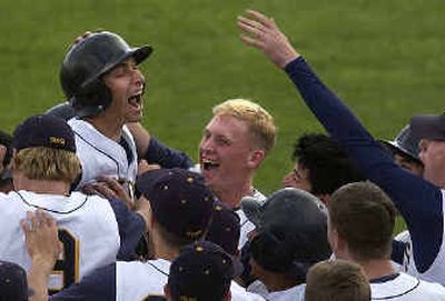 
Southridge's Chad Arnold, left, hit a tying homer vs. NC.Southridge's Chad Arnold, left, hit a tying homer vs. NC.
 (Jed Conklin/Jed Conklin/ / The Spokesman-Review)