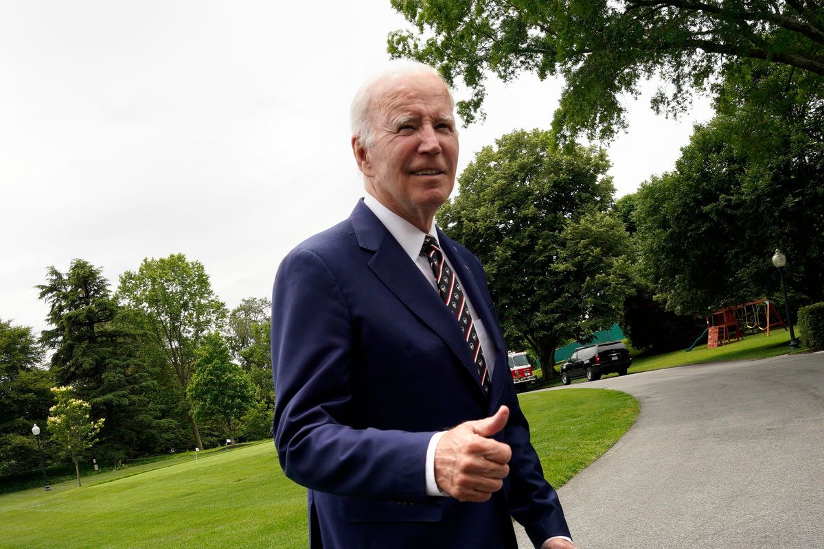 President Joe Biden offers a thumbs up to members of the media on the South Lawn of the White House upon his return to Washington, D.C., from Wilmington, Delaware, on Sunday, May 28, 2023.  (Yuri Gripas/Abaca Press/TNS)