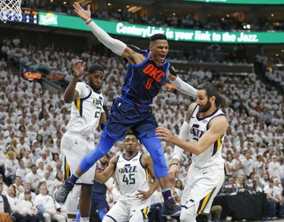Oklahoma City Thunder guard Russell Westbrook (0) reacts after loosing the ball as Utah Jazz’s Royce O’Neale, left, Donovan Mitchell (45) and Ricky Rubio, right, defend in the first half during Game 4 of an NBA basketball first-round playoff series Monday, April 23, 2018, in Salt Lake City. (Rick Bowmer / Associated Press)