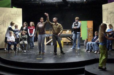 
Jay Anders, center right, dances with Lindsay Delong, 15, during rehearsal of the Lake City Playhouse production of 