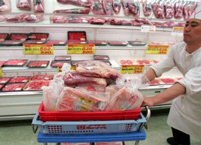
A cart carries beef products imported from Australia at a Hanamasa Co. supermarket in Tokyo last week. 
 (Associated Press / The Spokesman-Review)