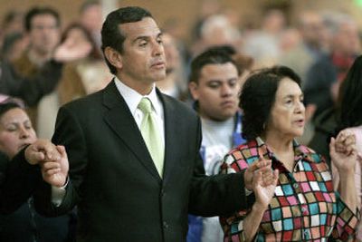 
Los Angeles Mayor Antonio R. Villaraigosa and Dolores Huerta, co-founder of the United Farm Workers, participate in a special Mass on Wednesday at the Cathedral of Our Lady of the Angels. The Mass included prayers for legislators who are debating immigration legislation.
 (Associated Press / The Spokesman-Review)