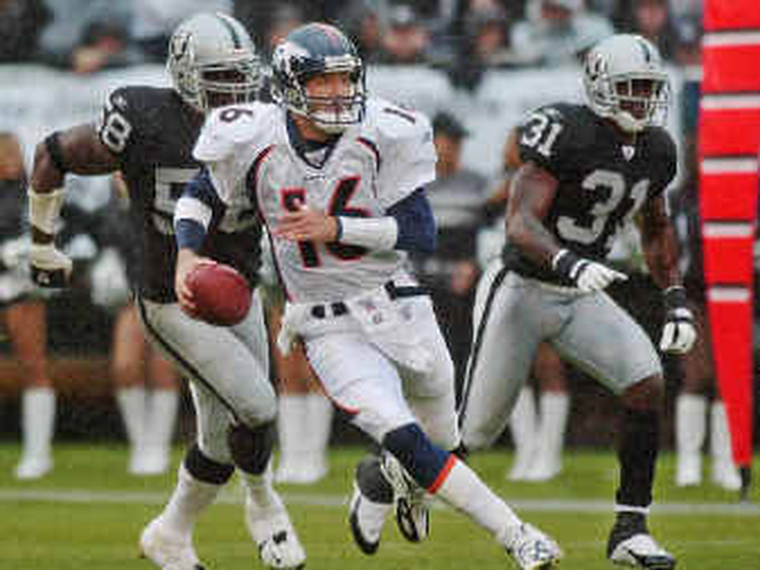 Brian Griese (14) gets set to throw – Denver Broncos History