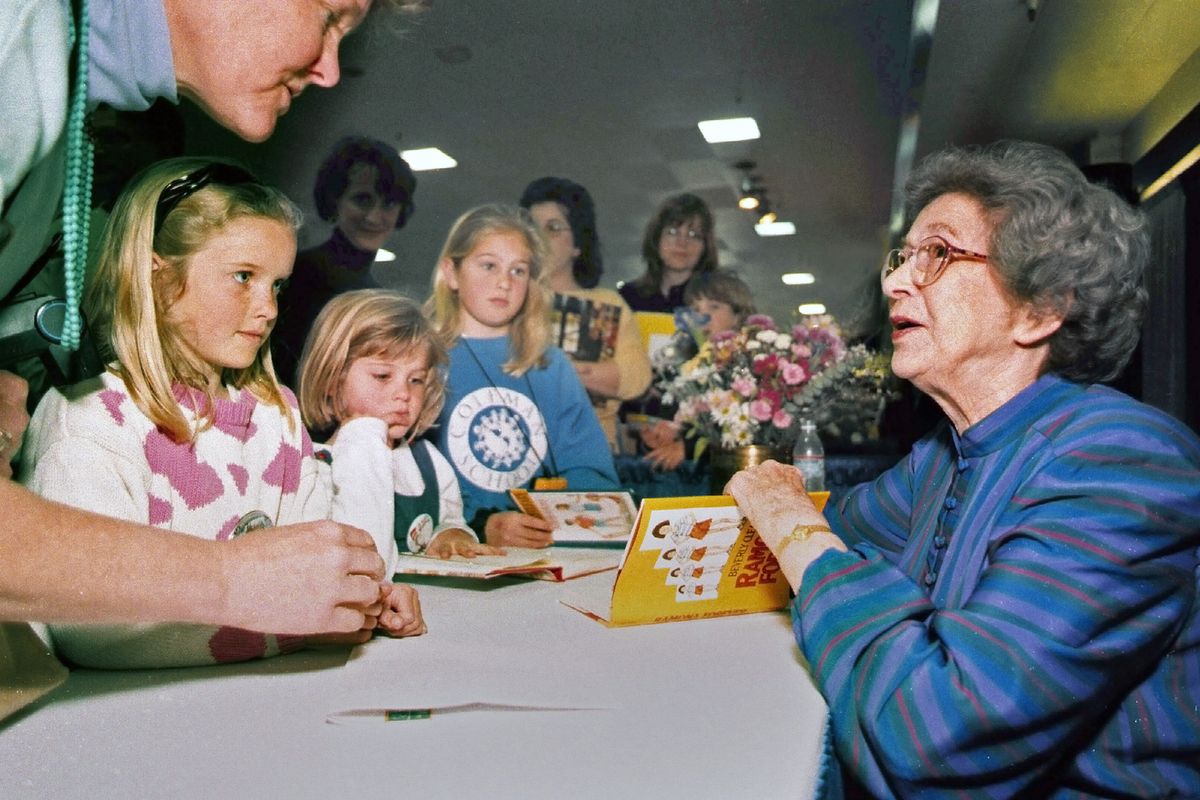 FILE - In this April 19, 1998 photo, Beverly Cleary signs books at the Monterey Bay Book Festival in Monterey, Calif. The beloved children