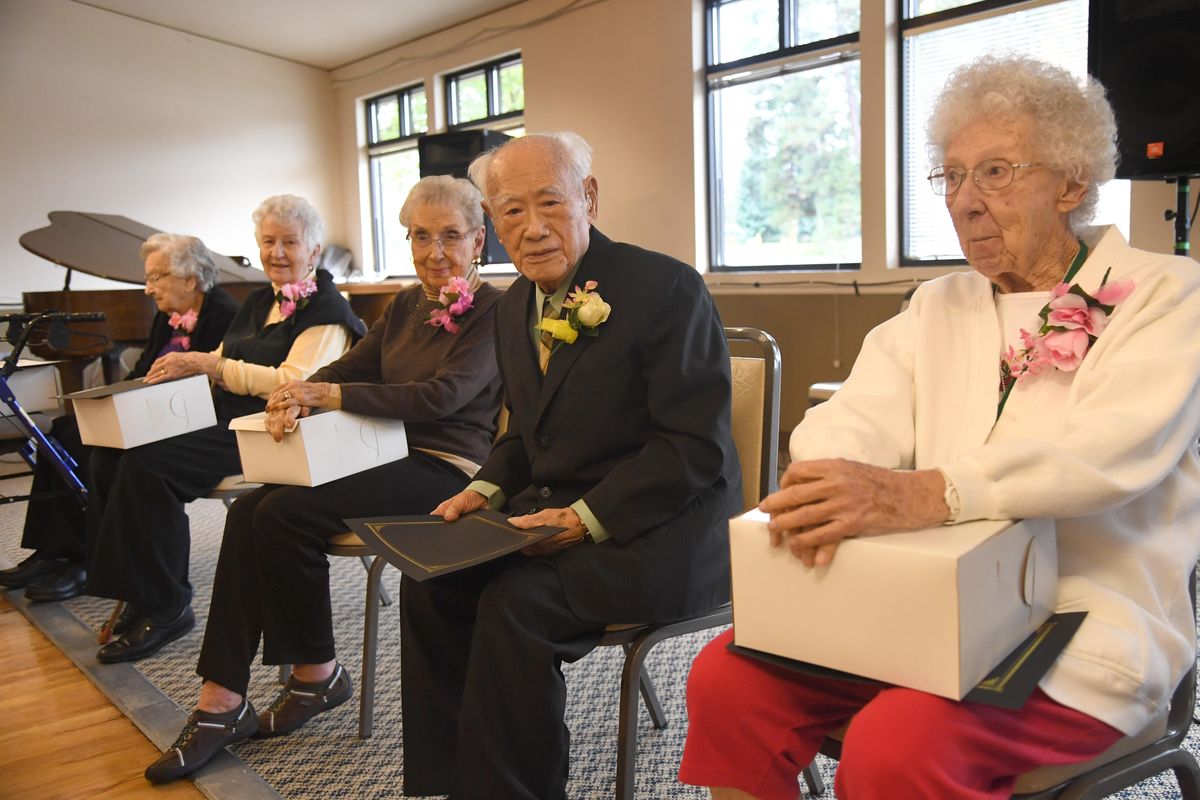 Centenarians attending the luncheon Tuesday, Oct. 18, 2016, include, from left, Leona Chase, Marie Pilgrim, Martha Lu Butler, Han-Chung Meng and Lucille Durkee, at the Southside Senior Center. Each received a congratulatory certificate from the mayor and a cake to take home. (Jesse Tinsley / The Spokesman-Review)
