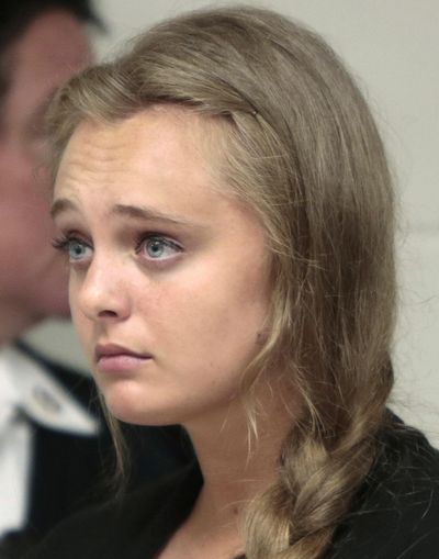 In this Aug. 24, 2015, photo, Michelle Carter listens to defense attorney Joseph  Cataldo argue for an involuntary manslaughter charge against her to be dismissed at Juvenile Court in New Bedford, Mass. (Peter Pereira / Associated Press)