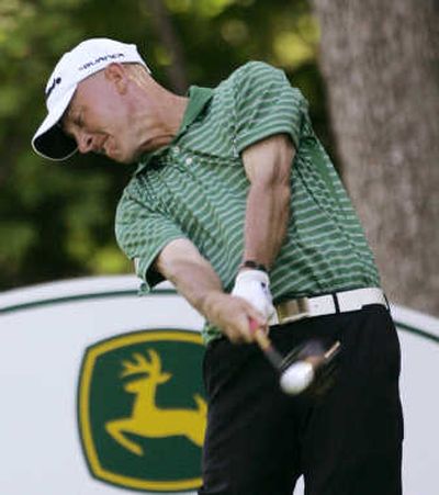 
Leader Nathan Green launches his tee shot at the 17th hole Friday. Associated Press
 (Associated Press / The Spokesman-Review)