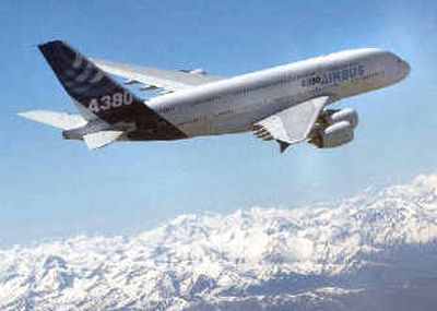 The Airbus A380 flies past the Pyrenees mountains during its maiden flight on Wednesday.
(Associated Press / The Spokesman-Review)