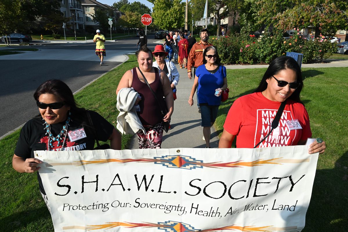 About 200 people rallied in the Indigenous Peoples Day March, which began at Mission Park and looped through the Logan neighborhood, Monday, October 10, 2022. The march was in honor of Native residential school survivors, the children who did not come home, the current nationwide MMIWP (Missing and Murdered Indigenous Women and People) epidemic, as well as the domestic violence that indigenous people suffer through.  (COLIN MULVANY/THE SPOKESMAN-REVIEW)