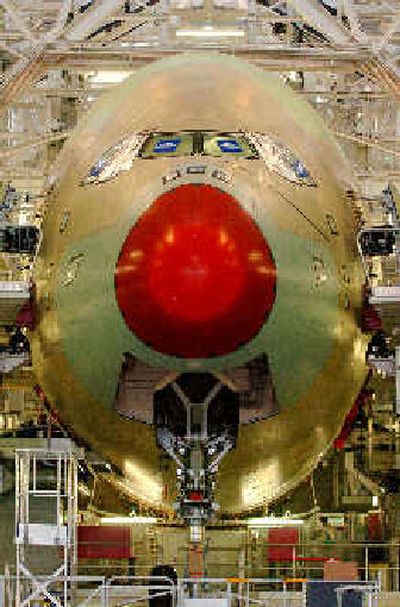 
An A380 superjumbo jet sits on its assembly line in Toulouse. 
 (Associated Press / The Spokesman-Review)