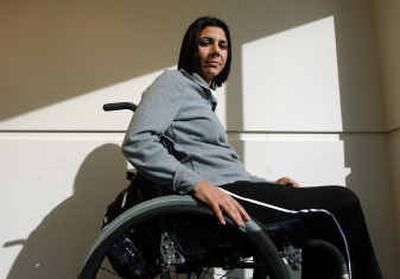 
Erica Nader, who has been paralyzed since an auto accident in March 2003, has seen progress since undergoing experimental stem cell surgery.
 (KRT / The Spokesman-Review)