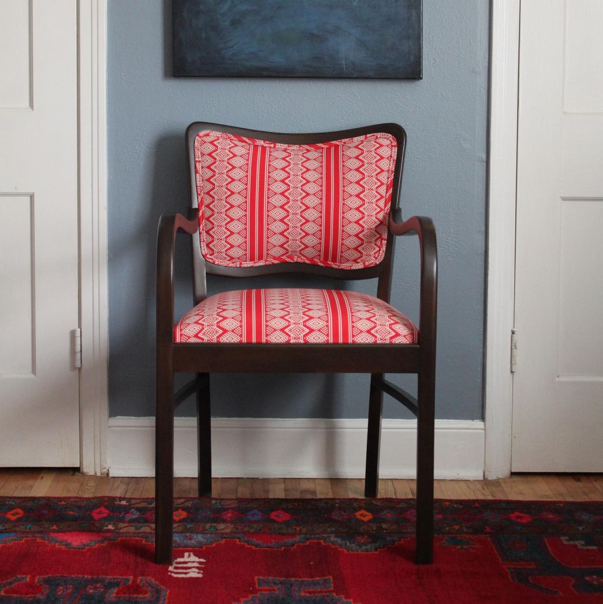 In this photo provided by Amanda Brown, Brown updated this chair for a tutorial, “Upholstery Basics: Picture Perfect Backs,” for the design blog Design*Sponge. Reupholstering furniture can be done with a few simple tools, patience and time, according to Brown, author of “Spruce: A Step-by-step Guide to Upholstery and Design” (Storey, 2013). (Amanda Brown / Associated Press via Amanda Brown)