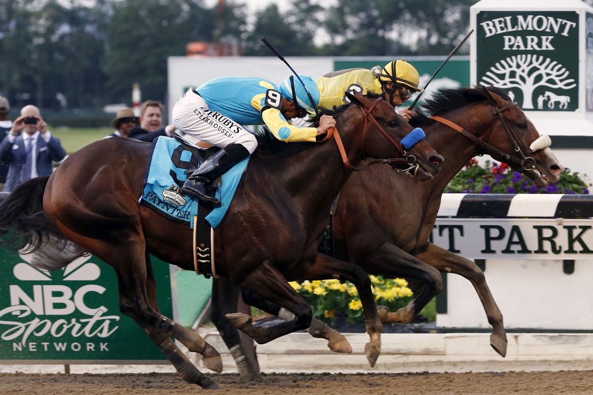 Union Rags with jockey John Velazquez, right, holds off Paynter with jockey Mike Smith to win the 144th Belmont. (Associated Press)