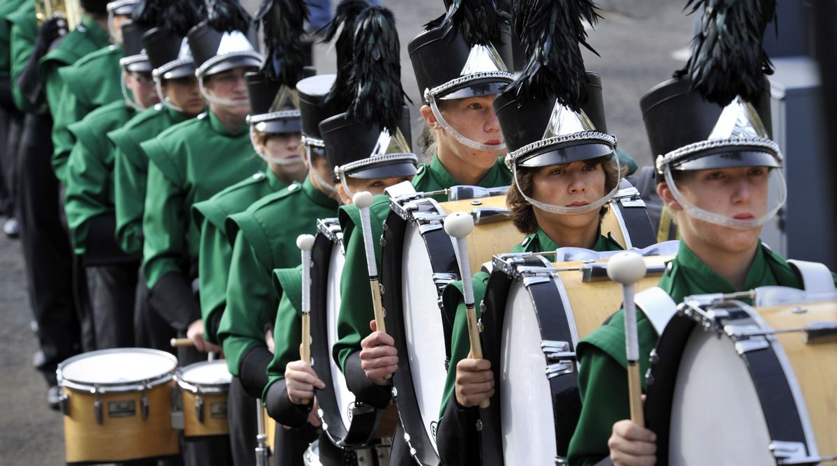 Members of the East Valley Marching Band prepare to take the field at Joe Albi Stadium as they participate in the Sounds of Thunder 2010 Pacific Northwest  Marching Band Competition, October 9, 2010 in Spokane, Wash. (Dan Pelle / The Spokesman-Review)