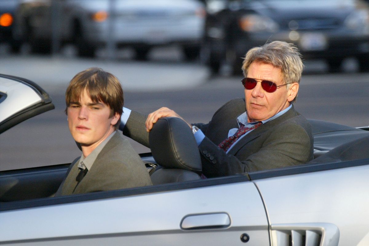Josh Hartnett, left, and Harrison Ford film a scene on the set of their movie "Hollywood Homicide" on Rodeo Drive on Sept. 17, 2002, in Beverly Hills, Calif. (Getty Imagse)