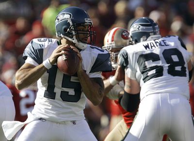 Seattle may start quarterback Seneca Wallace against the Eagles. (Associated Press / The Spokesman-Review)