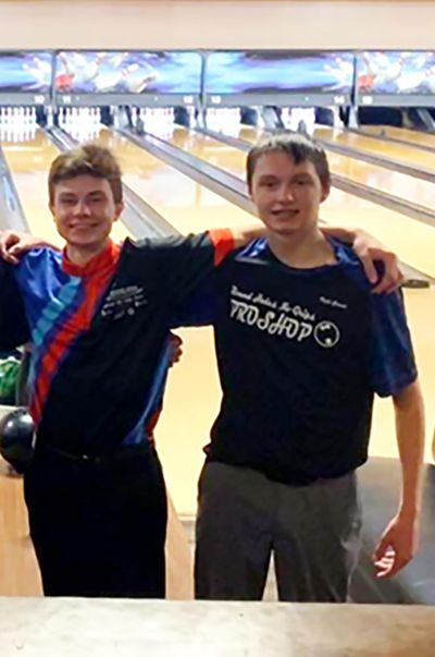 Alex Holodnick, left, won the recent Junior Bowlers Tour stop at Players & Spectators, while Kyle Groves, right, bowled a 300 game. (Cindi Snyder / Courtesy)