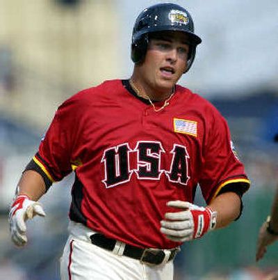 
United States' Billy Butler rounds bases after a two-run homer in Futures Game.
 (Associated Press / The Spokesman-Review)