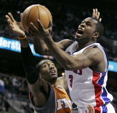 
Ex-EWU star Rodney Stuckey of the Pistons goes to the basket against Suns forward Amare Stoudemire. Associated Press
 (Associated Press / The Spokesman-Review)