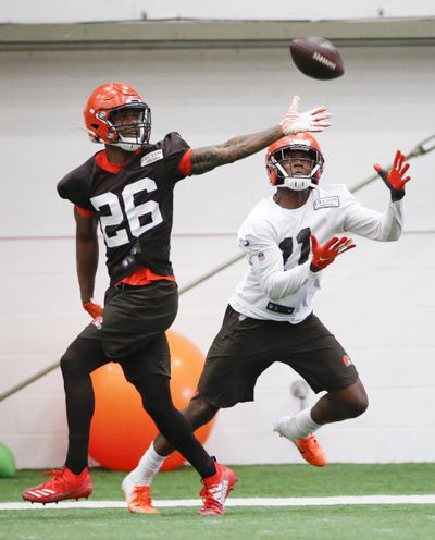 Cleveland Browns cornerback Greedy Williams (26) defends against Antonio Callaway (11) during practice at the team’s NFL football training facility in Berea, Ohio, Thursday, June 6, 2019. (Ron Schwane / Associated Press)