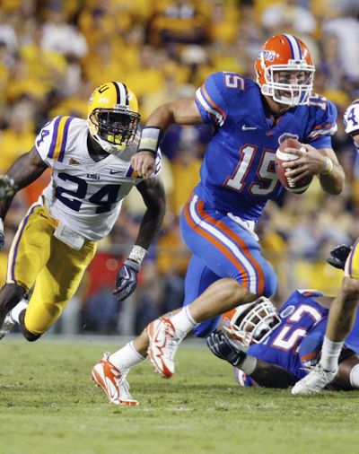 Florida quarterback Tim Tebow returned to action Saturday night and led the Gators to victory at LSU.  (Associated Press / The Spokesman-Review)