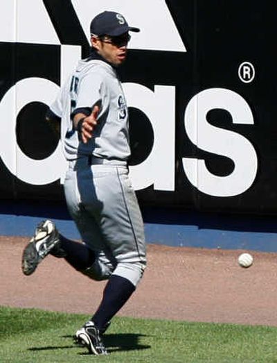
Seattle's Ichiro Suzuki chases down New York's Jose Molina's eighth-inning RBI single.Associated Press
 (Associated Press / The Spokesman-Review)