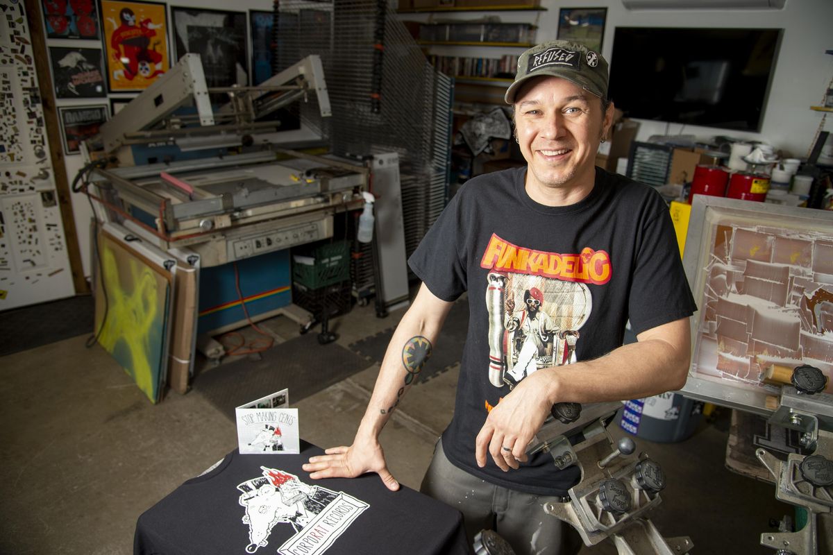 Kris Martin, who runs a small print shop out of his garage in Spokane, also runs CorpoRat Records,  a tiny independent label with a handful of local bands. (Jesse Tinsley / The Spokesman-Review)