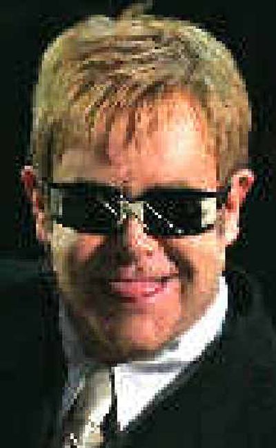 
Elton  John
 (The Spokesman-Review)
