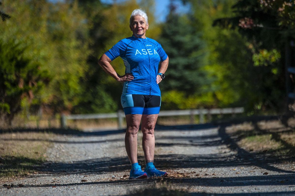 Dexter Yeats, 74, poses for a picture at her Hayden home. She recently won her age group at Ironman in South Africa. (Kathy Plonka / The Spokesman-Review)