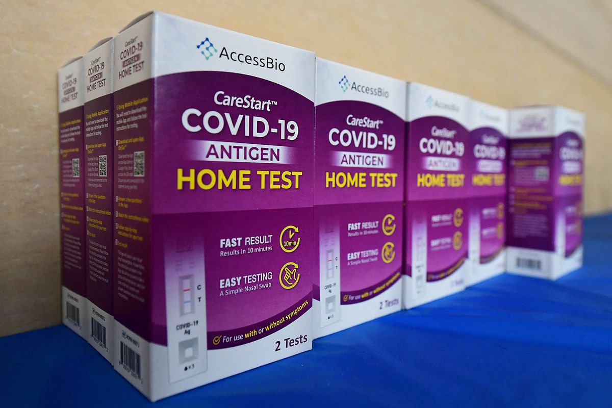 Rapid COVID-19 test kits await distribution for free to people receiving their COVID-19 vaccines or boosters at Union Station in Los Angeles, California, on Jan. 7, 2022. (Frederic J. Brown/AFP via Getty Images/TNS)  (Frederic J. Brown/AFP/Getty Images North America/TNS)