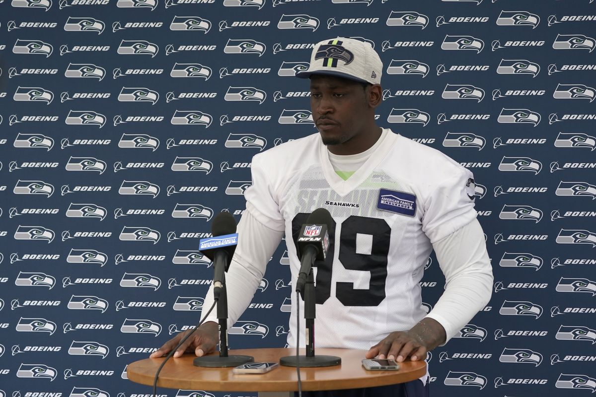 Seattle Seahawks defensive end Aldon Smith talks to reporters after NFL football practice Saturday, July 31, 2021, in Renton, Wash.  (Associated Press)