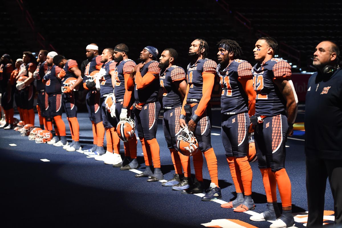 Spokane Shock stand for the Nation Anthem before their IFL game against the Frisco Fighters on Sat. May 15, 2021 at Spokane Arena in Spokane WA.   (James Snook/For The Spokesman-Review)