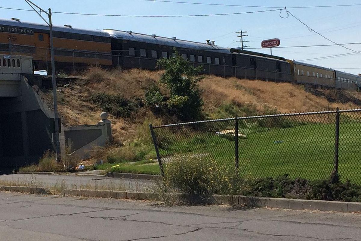 Old trains from the former rail museum at the Spokane County Fair and Expo Center moved through Spokane on the downtown viaduct over Walnut Street on Friday, Aug. 26, 2016 on their way to a new home at the Inland Northwest Rail Museum just west of Reardan. (Jonathan Brunt / The Spokesman-Review)