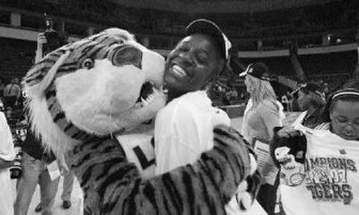 
Porsha Phillips celebrates with the school mascot after LSU advanced to the Final Four. 
 (Associated Press / The Spokesman-Review)
