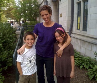 Sara Wade, an Illinois schoolteacher, poses for a photograph with her son, Dominic, 8,  and daughter, Genevieve, 10, in Evanston, Ill. Wade, the sole source of support for her children, divorced in 2004.  Her ex-husband, a contractor, hasn’t been able to pay child support since January 2009.  (Associated Press)