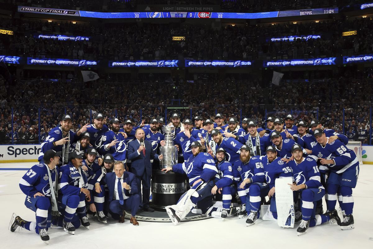 The Tampa Bay Lightning pose with the Stanley Cup after defeating the Montreal Canadiens 1-0 in Game 5 to win the NHL hockey Stanley Cup Finals, Wednesday, July 7, 2021, in Tampa, Fla.  (Associated Press)