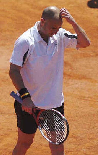 
Andre Agassi puzzled by first-round loss in French Open. Andre Agassi puzzled by first-round loss in French Open. 
 (Associated PressAssociated Press / The Spokesman-Review)