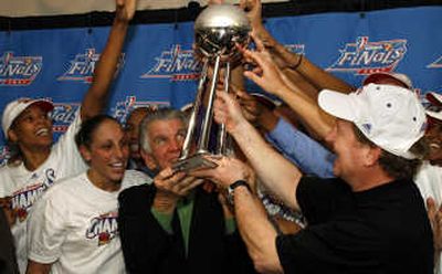 
Coach Paul Westhead, right, and the Mercury celebrate the team's first title. Associated Press
 (Associated Press / The Spokesman-Review)