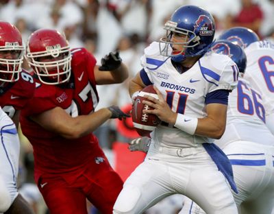 Kellen Moore is among a large group of QBs who will be scrutinized during NFL draft, perhaps by Seahawks. (Associated Press)