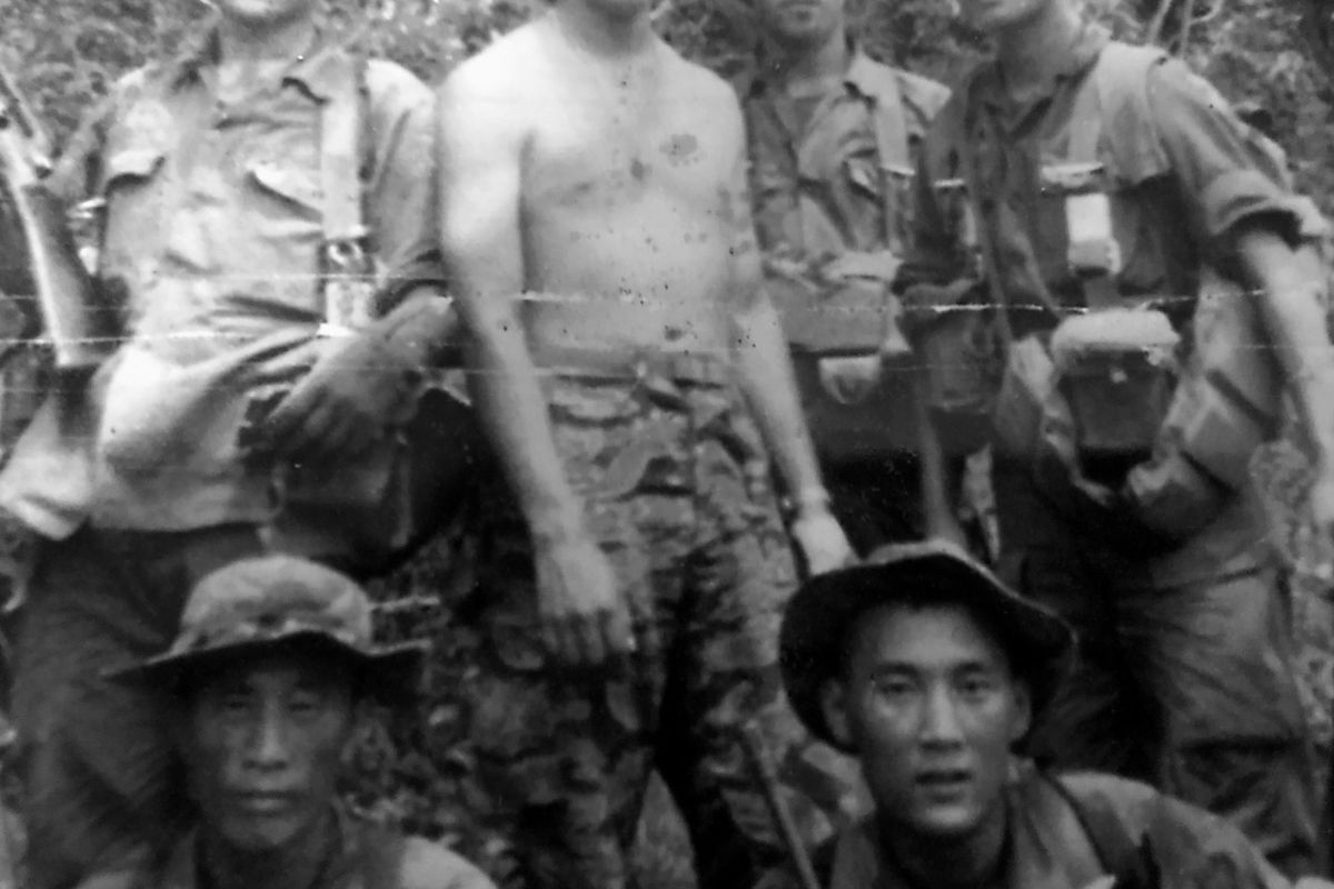 George Bearpaw, shirtless in center, a citizen of the Cherokee Nation of Oklahoma, grew up hearing his WWII veteran father, Thomas Bearpaw, talk about his time in the Army during World War II. Bearpaw, who served in Vietnam, lives in Springfield, Va.  (George Bearpaw)