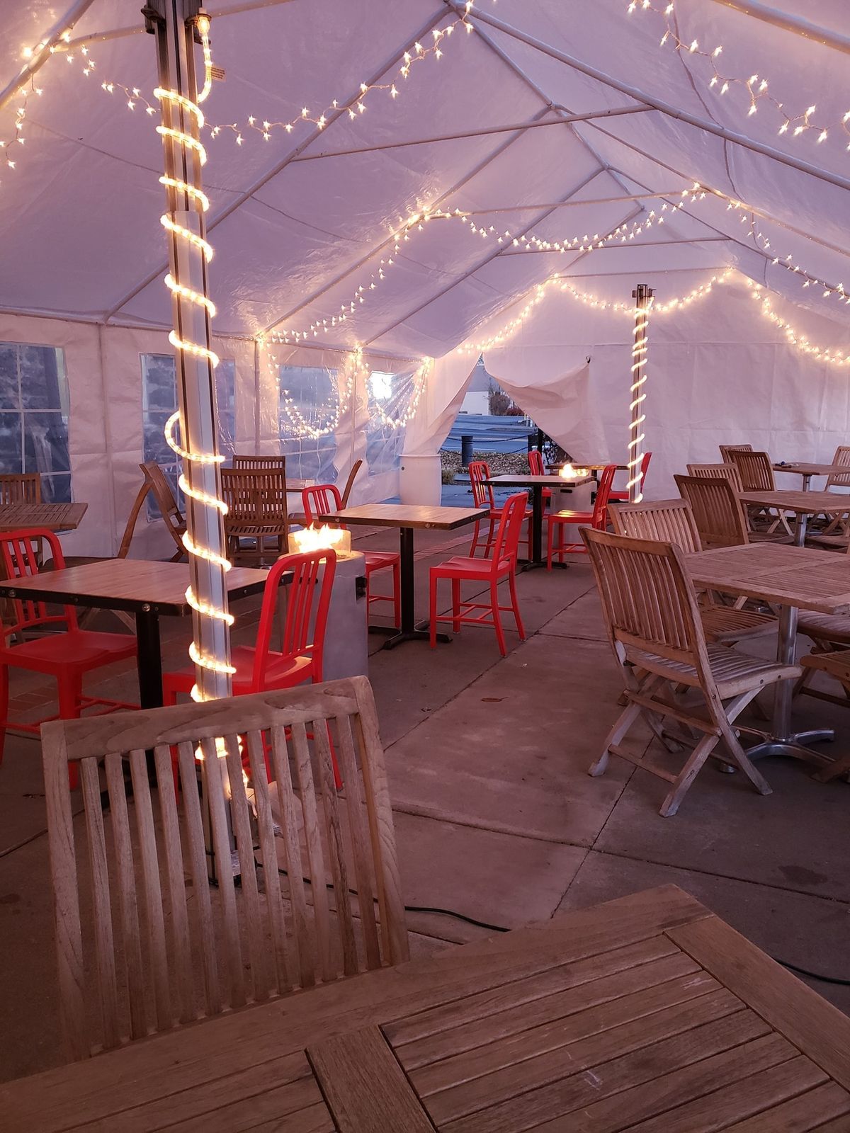 Bark, A Rescue Pub, which opened its doors in August, has installed a large vaulted tent with lights.  (Kris Kilduff/For The Spokesman-Review)