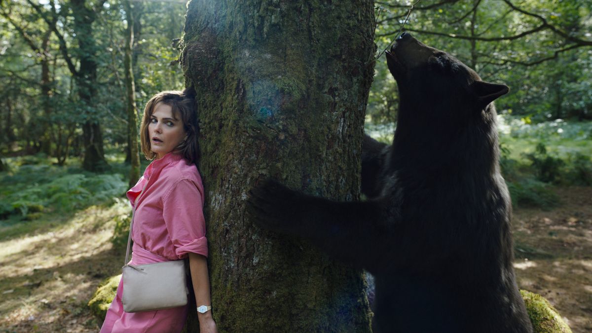 Keri Russell as Sari, who is trying to save her child from a doped-to-the-gills bruin in “Cocaine Bear.” (Pat Redmond/Universal Pictures)
