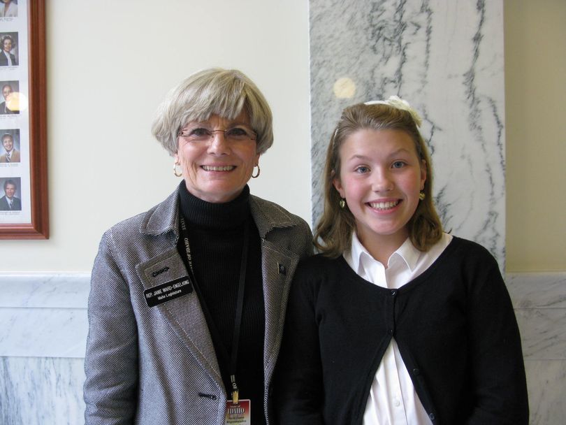 Ilah Hickman, 12, right, with Rep. Janie Ward-Engelking, D-Boise, left, in the state Capitol on Wednesday, after Ilah convinced a House committee to introduce her bill making the Idaho giant salamander the official state amphibian. (Betsy Russell)