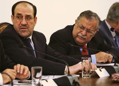 Iraqi Prime Minister Nouri al-Maliki, left, and President Jalal Talabani are seen during a meeting in Baghdad on Friday.  (Associated Press / The Spokesman-Review)