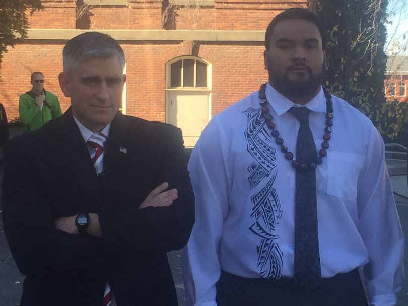 State Senator Michael Baumgartner and suspended WSU football player Robert Barber after the WSU regents meeting. (Jacob Thorpe / The Spokesman-Review)