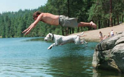 
During the height of summer heat, the Dog Days of Summer, watch weather forecasts for air quality and use it to gauge activities for you and your best friend. It may be so hot that you both need to take a dip.
 (SR File Photo / The Spokesman-Review)