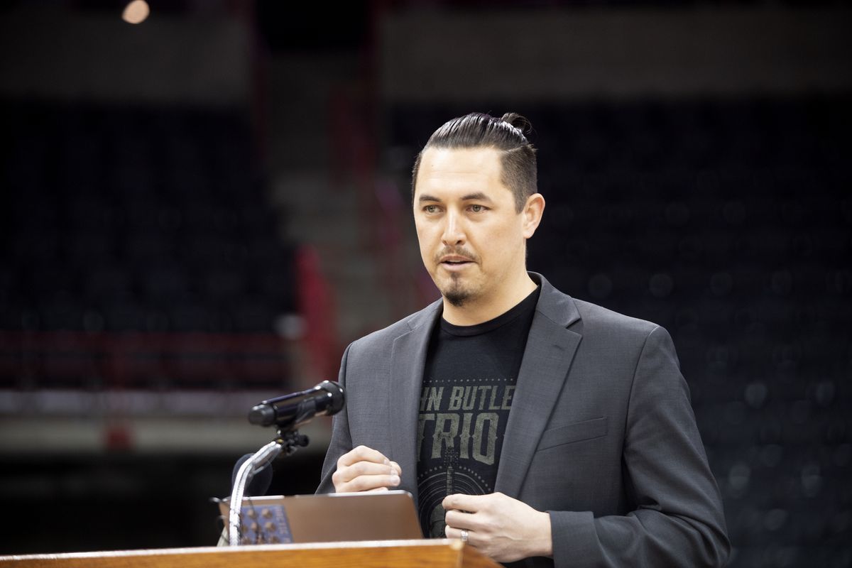 Matt Meyer, Spokane Public Facilities District director of entertainment, steps to the podium Friday inside the Spokane Arena and announces that Paul McCartney will open his 13-city U.S. tour on April 28 in Spokane.  (Jesse Tinsley/The Spokesman-Review)